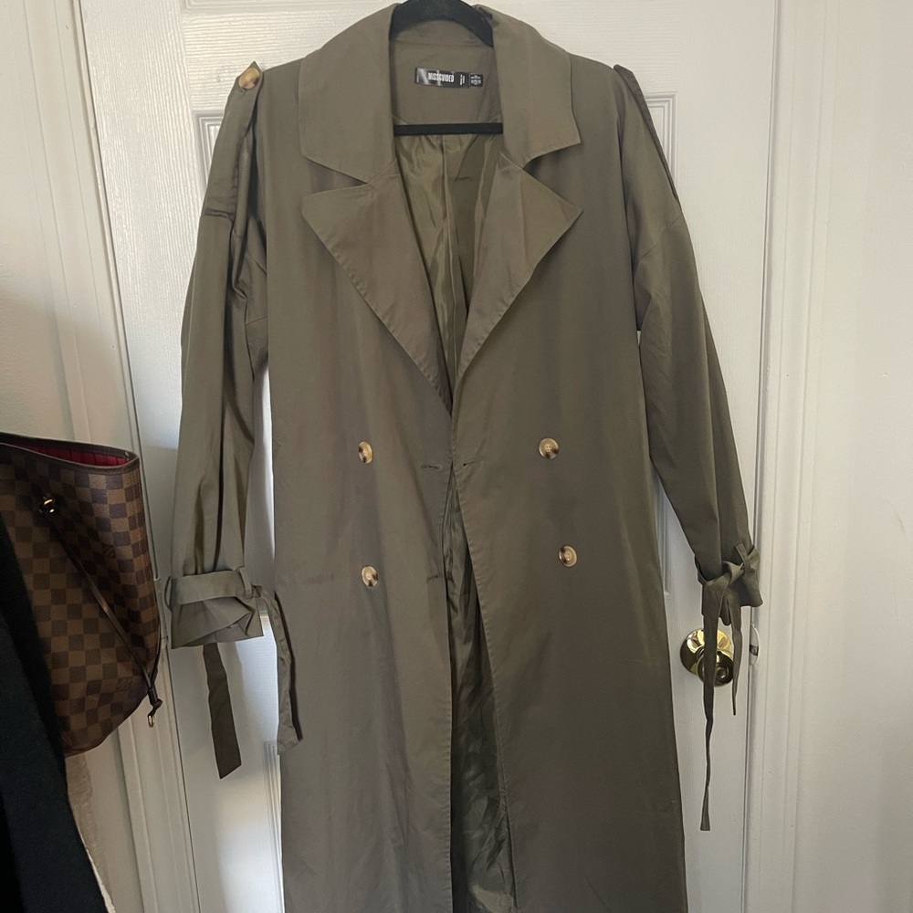 misguided green trench coat